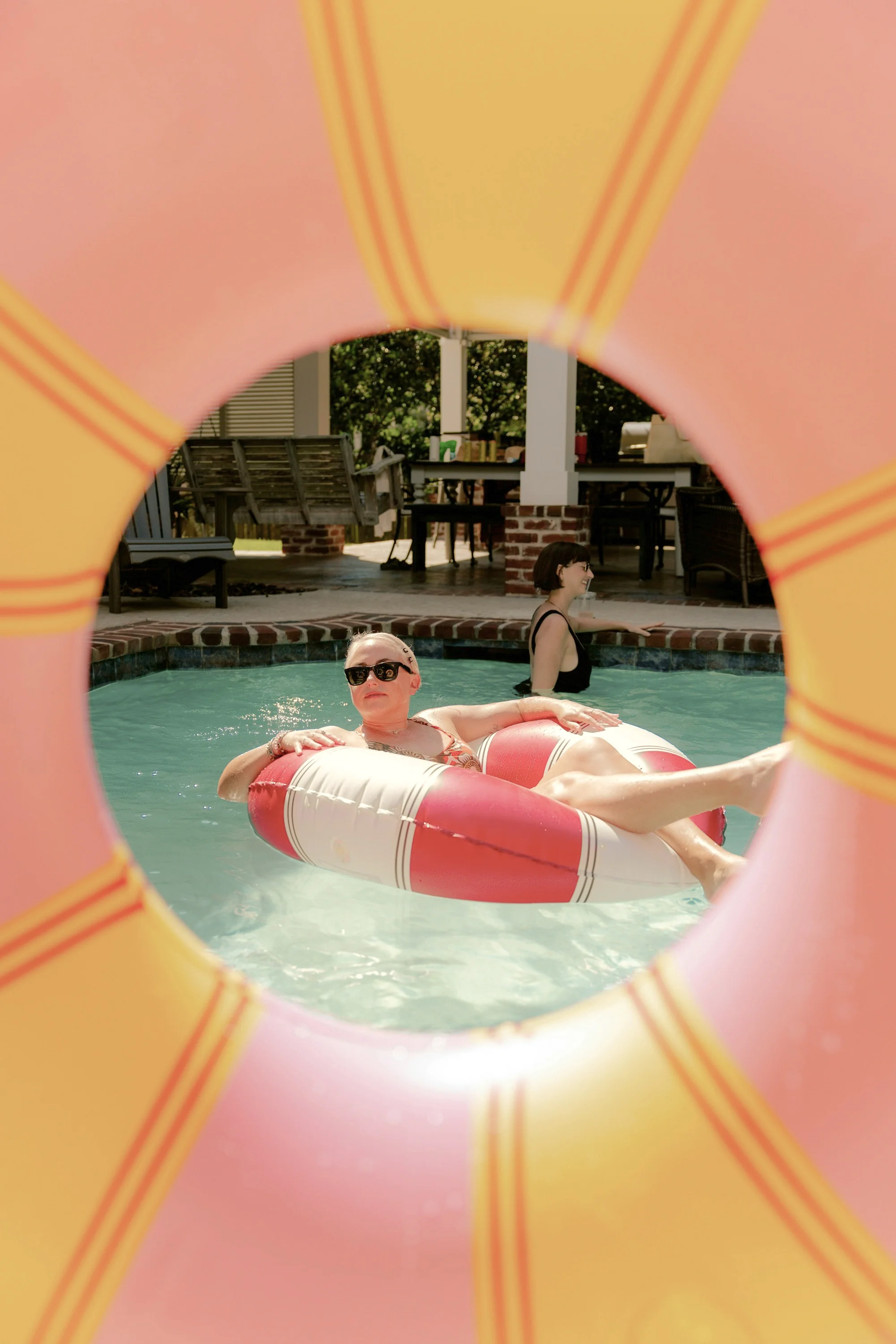 View through a pool floating of relaxation in a pool.